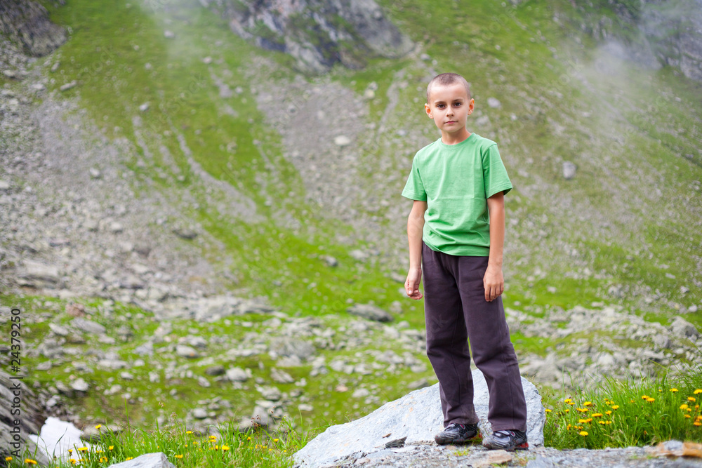 Cute kid outdoor in mountains