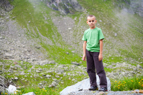 Cute kid outdoor in mountains