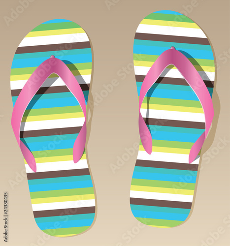 vector pair of flip flops on the sand