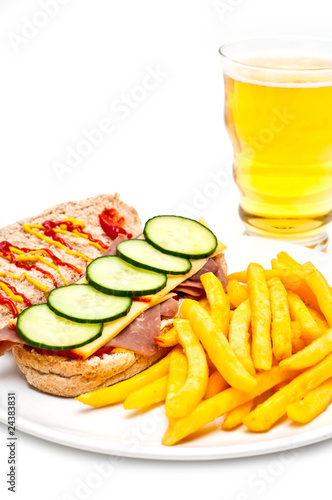 freshly made beef sandwich served with french fries and beer
