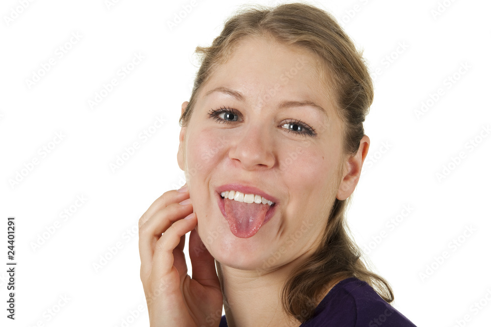 young woman stretches out her tongue young woman stretches out her tongue