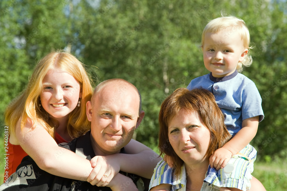 Fototapeta premium family from four against nature