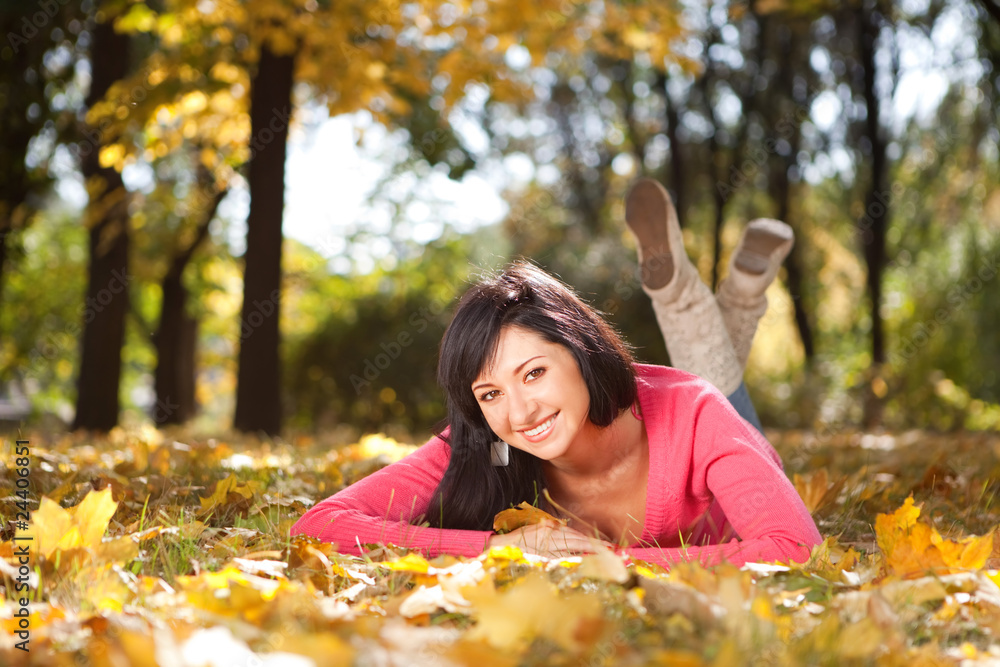 Young pretty woman rest in the autumn park Young pretty woman rest in the autumn park