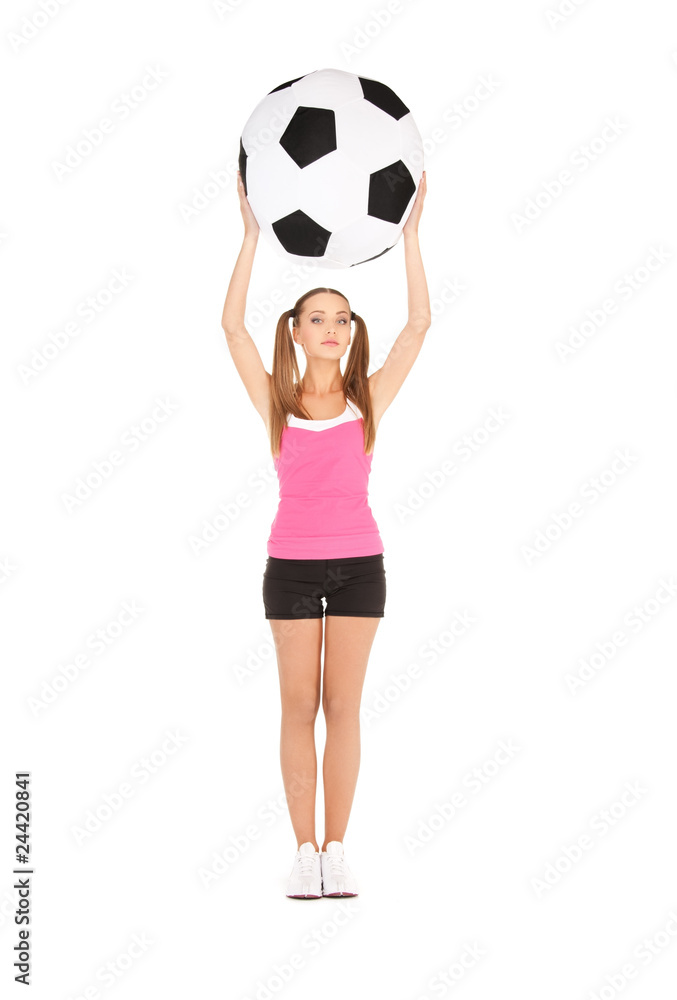 lovely woman with big soccer ball