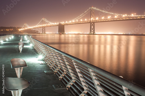 Bay Bridge at Night from pier in San Francisco photo