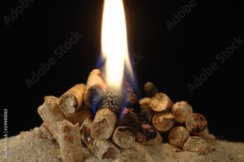 Holzpellets mit Feuer und Glut photo
