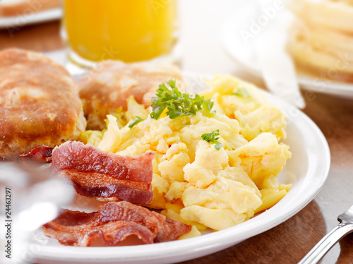 bright sunny breakfast with scrambled eggs and bacon