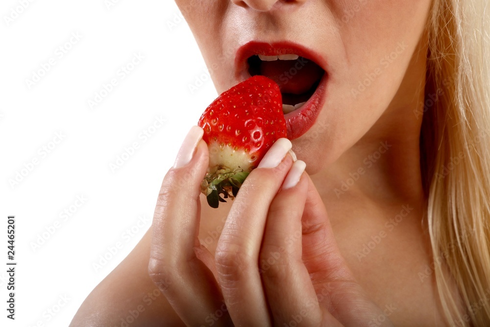 young beautiful woman with a strawberry (white background)) young beautiful woman with a strawberry (white background))