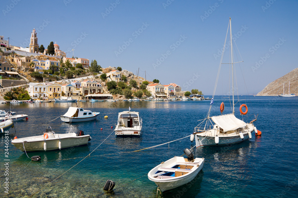 Obraz premium Boats in bay of symi island
