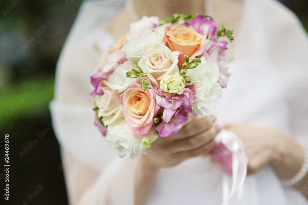 Bride holding beautiful wedding flowers bouquet