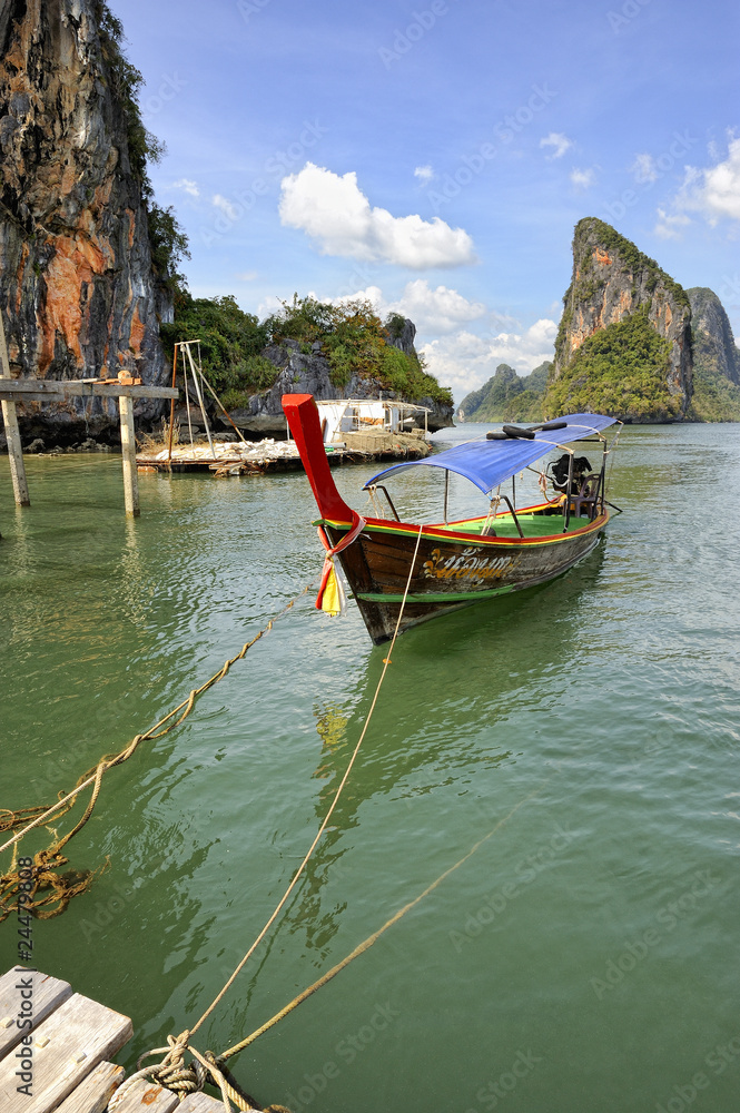Traditional long tail boat moored at Ko Panyi, Thaïlande