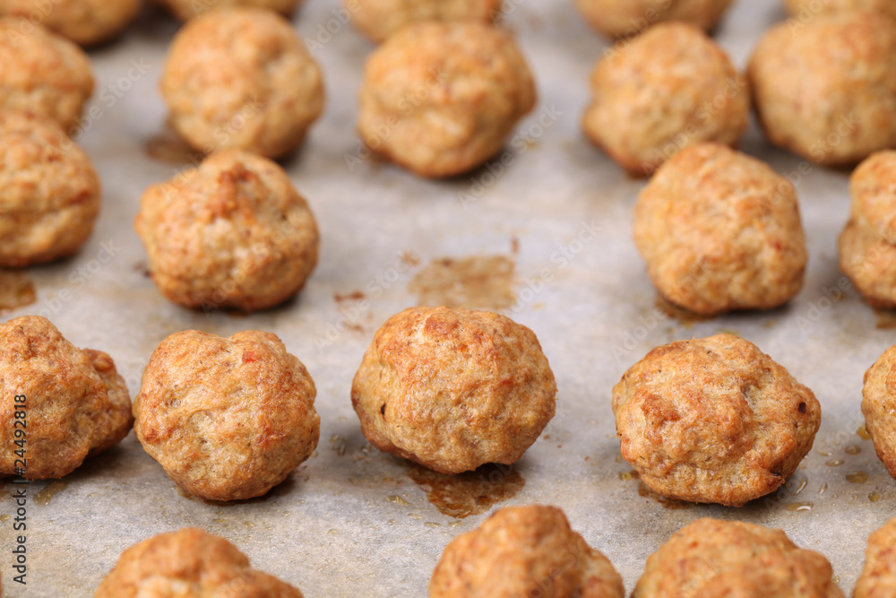Roast meatballs on baking sheet. Shallow DOF Roast meatballs on baking sheet. Shallow DOF