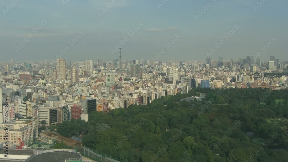 Time lapse Tokyo skyline, park and small construction site Time lapse Tokyo skyline, park and small construction site