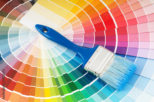 color palette and brush with blue handle