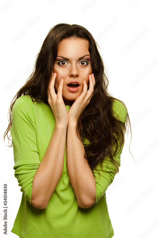 Fototapeta premium Surprising young woman. Isolated on white