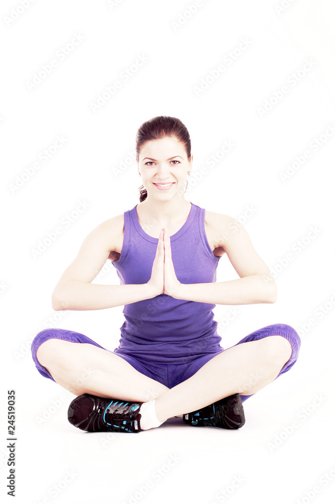 Young pretty girl doing yoga