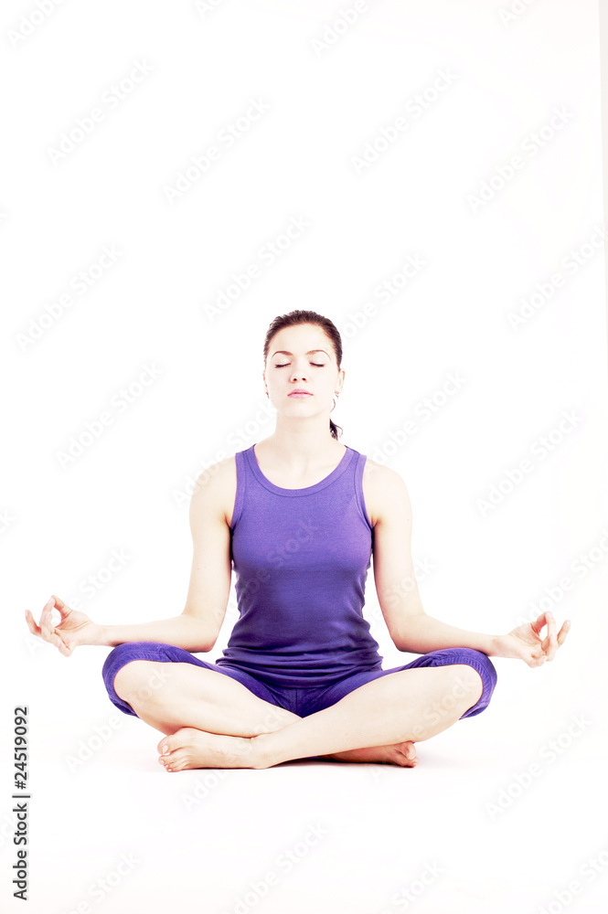 Young pretty girl doing yoga