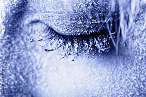 Frozen woman's eye covered in frost