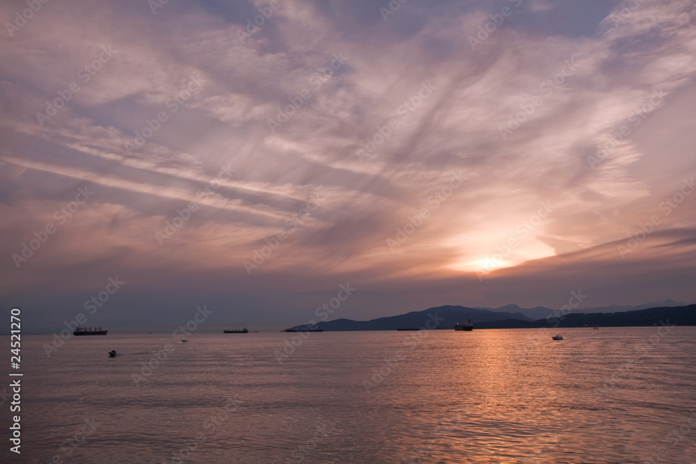 Cargo ships in Burrard Inlet at sunset Cargo ships in Burrard Inlet at sunset