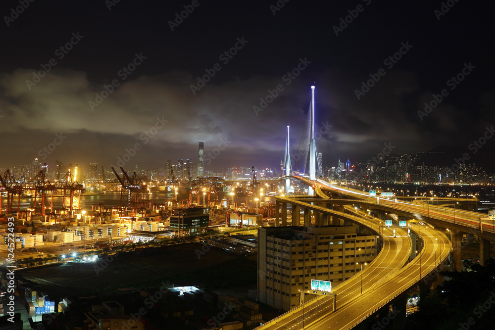 container terminal and bridge in Hong Kong at night