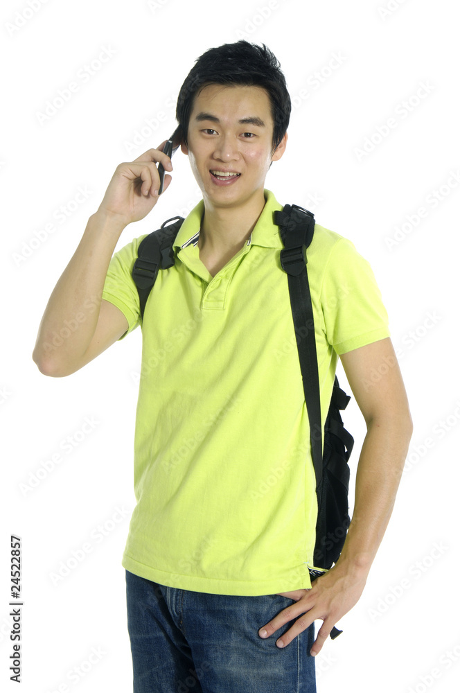 Young College Student on Cellphone with Backpack Young College Student on Cellphone with Backpack