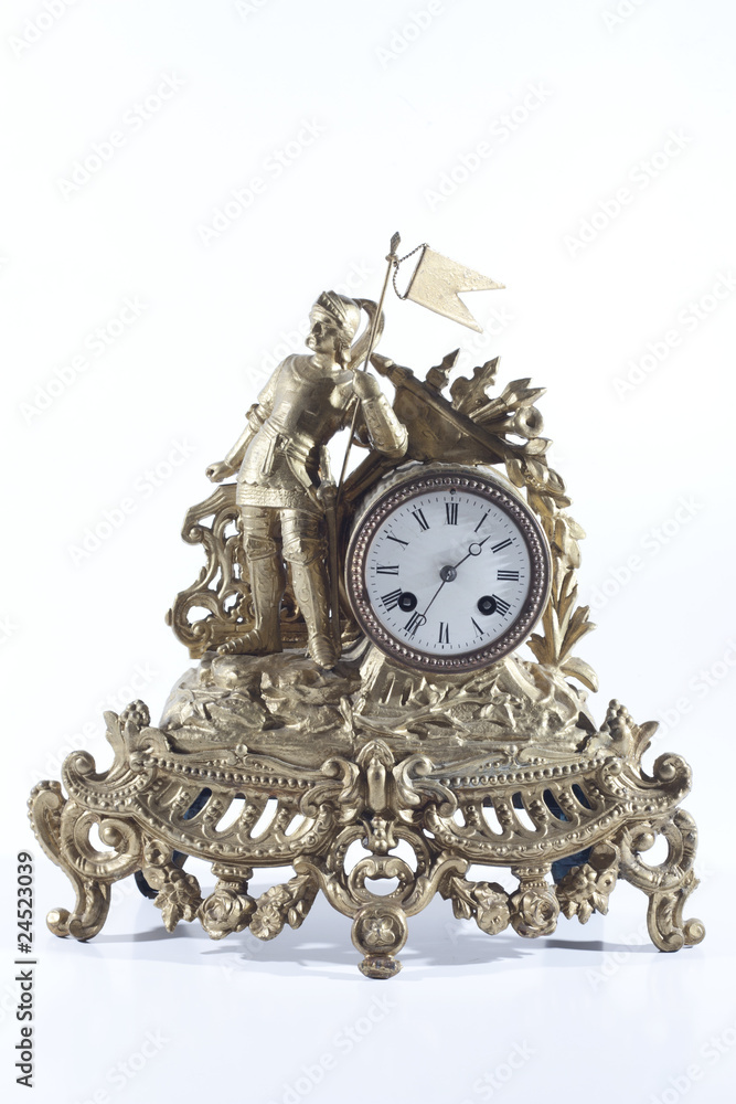 Old mechanical fireplace clock with the knight Old mechanical fireplace clock with the knight
