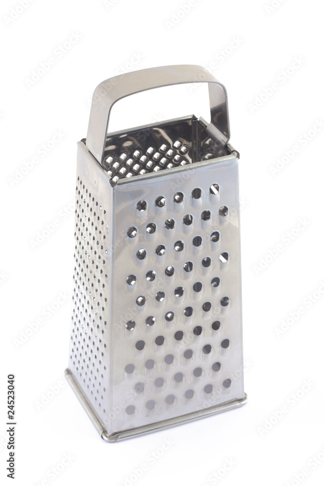 The steel grater on white background The steel grater on white background