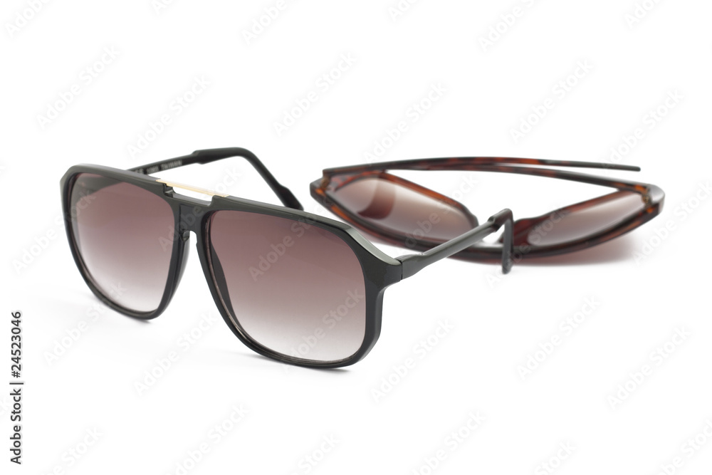 Two brown sunglasses on white Two brown sunglasses on white