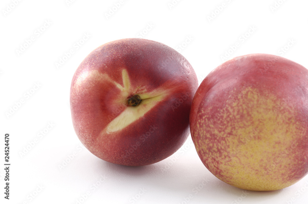 Two plum isolated on the white