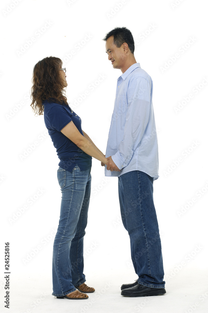 Full length of happy old couple standing together Full length of happy old couple standing together