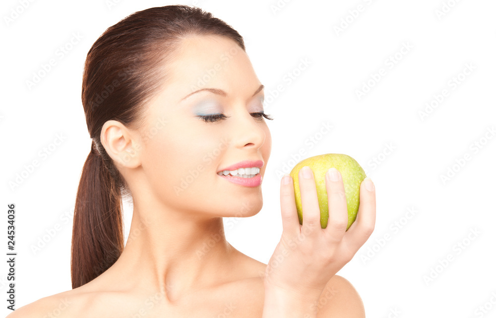 young beautiful woman with green apple young beautiful woman with green apple