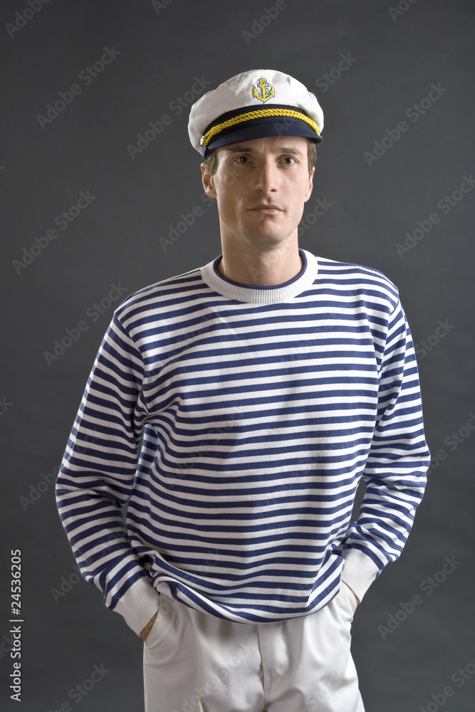 Young sailor man with white sailor hat Young sailor man with white sailor hat