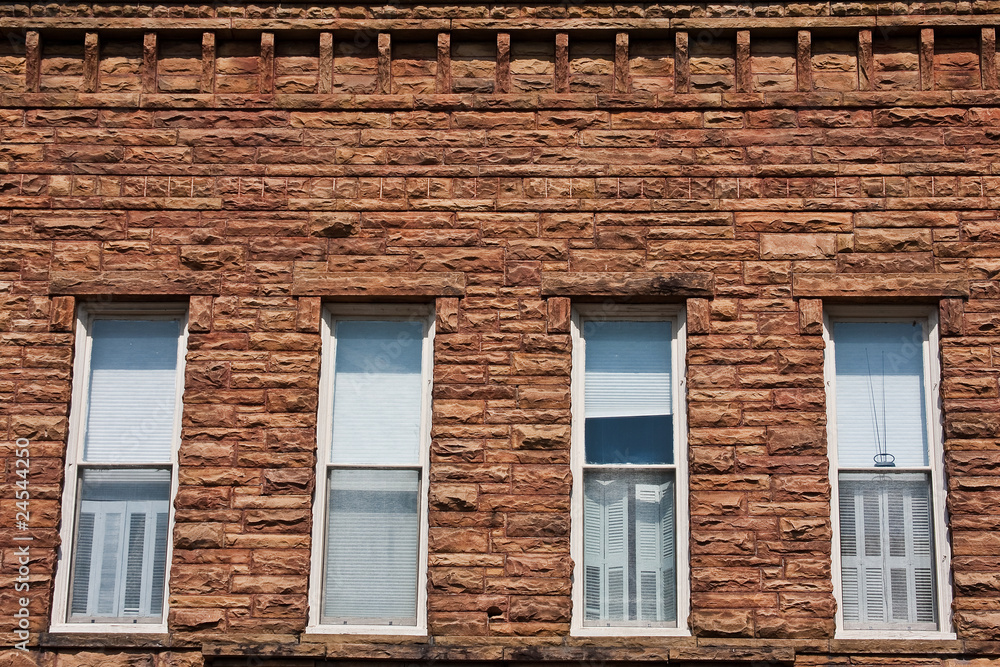 Brick Wall with Four Windows