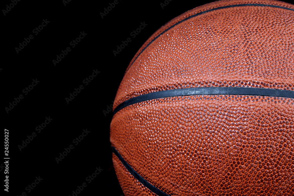 Obraz premium Basketball ball isolated on black