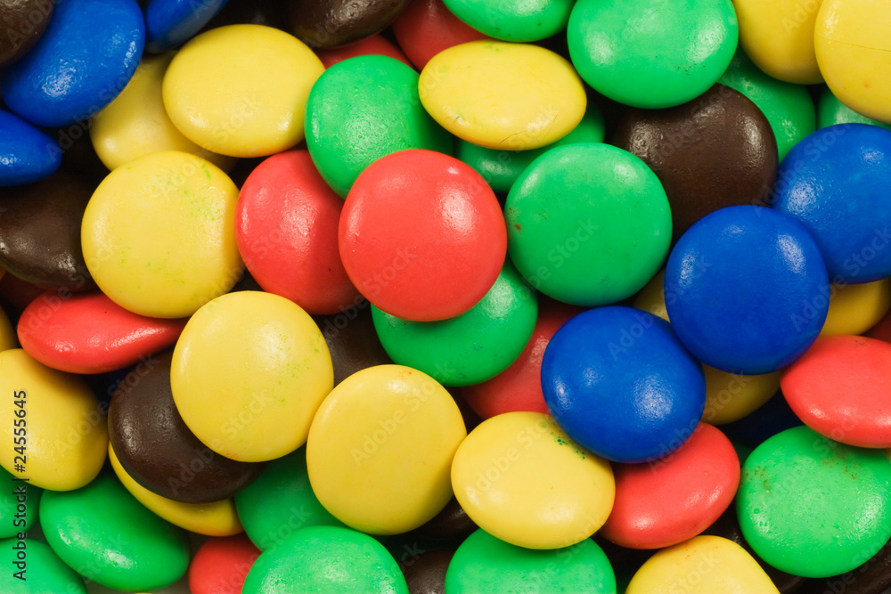 close-up of multicolored candy coated chocolate sweets close-up of multicolored candy coated chocolate sweets