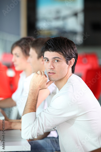 Young man in business training