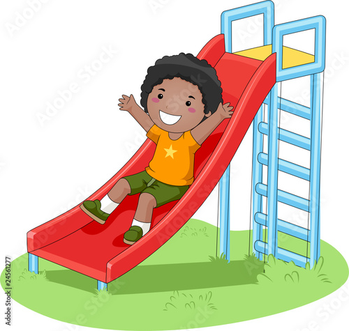 Boy Sliding In The Park