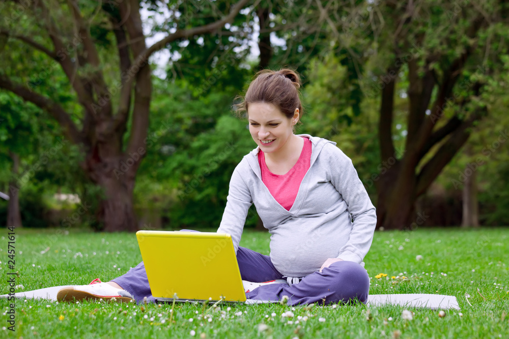 Beautiful pregnant woman in the park Beautiful pregnant woman in the park