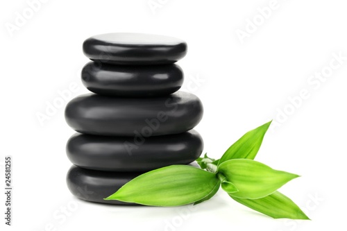 Stacked of stone with bamboo leaf