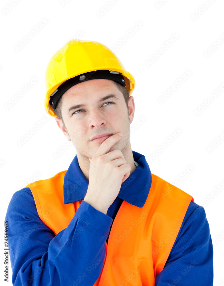 Pensive male worker wearing helmet Pensive male worker wearing helmet