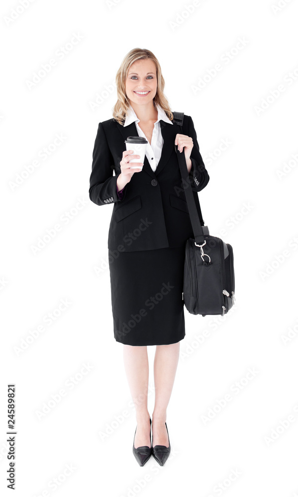 Smiling blond businesswoman holding coffee and a briefcase Smiling blond businesswoman holding coffee and a briefcase