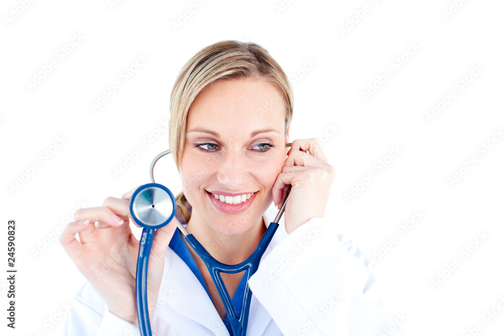 Radiant young female doctor holding a stethoscope Radiant young female doctor holding a stethoscope