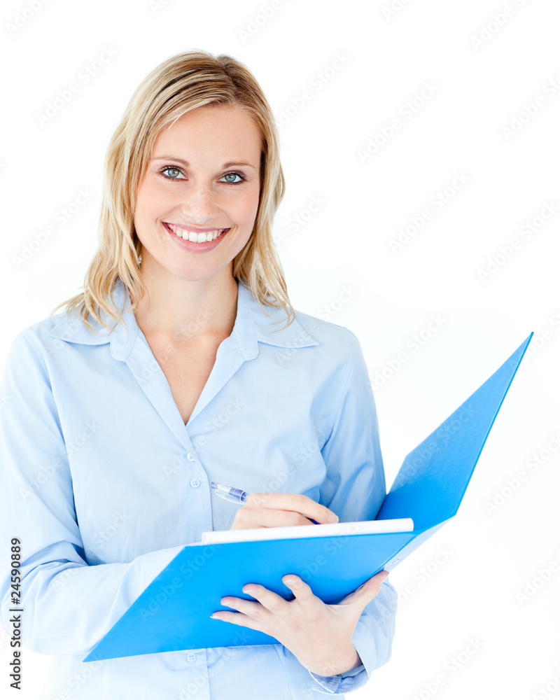 Charming businesswoman holding a folder smiling at camera Charming businesswoman holding a folder smiling at camera