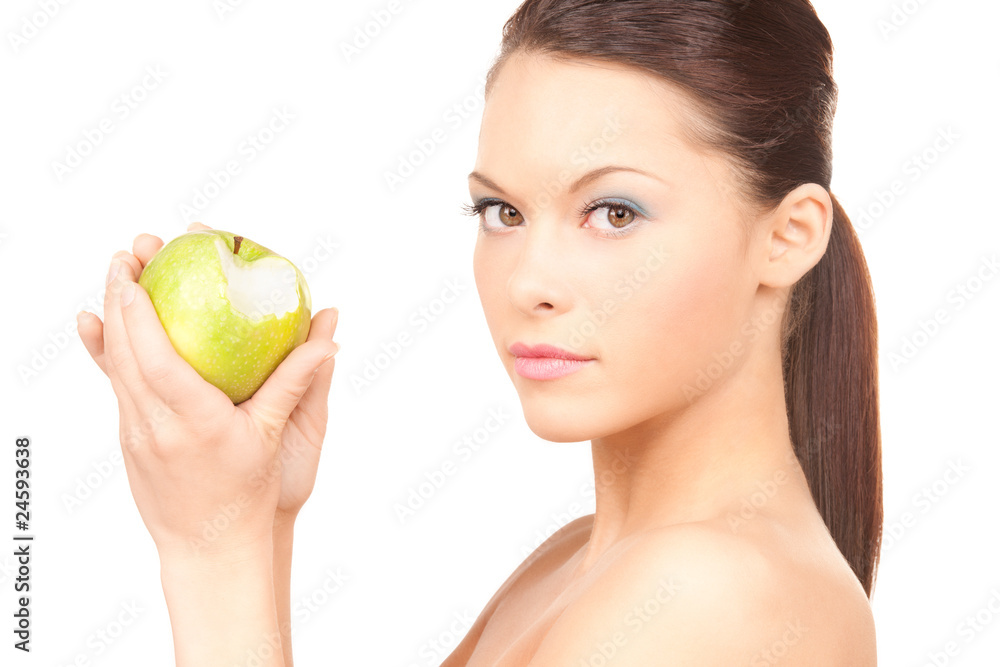 young beautiful woman with green apple young beautiful woman with green apple