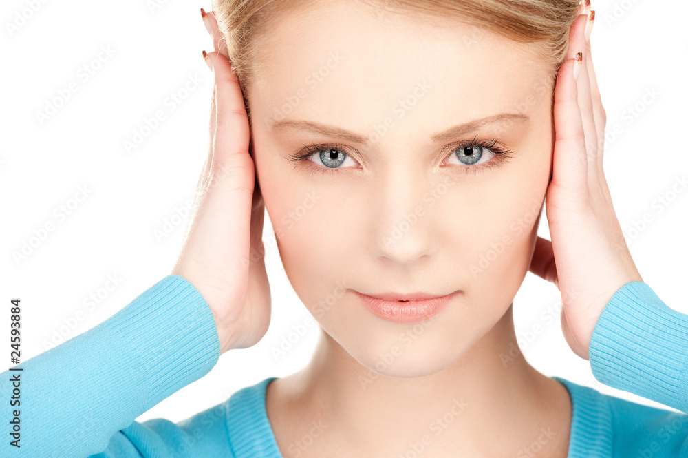 woman with hands on ears