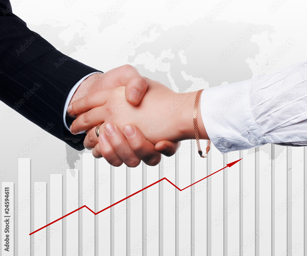 Handshake on an abstract background. Handshake on an abstract background.