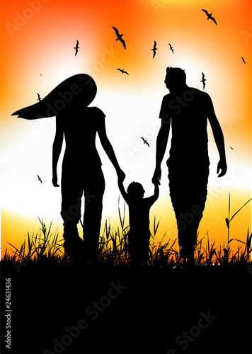 Family with little baby walk on summer field