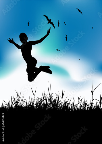 Summer holiday, man is jumping on meadow, black silhouette