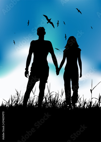 Couple walking on summer meadow, black silhouette