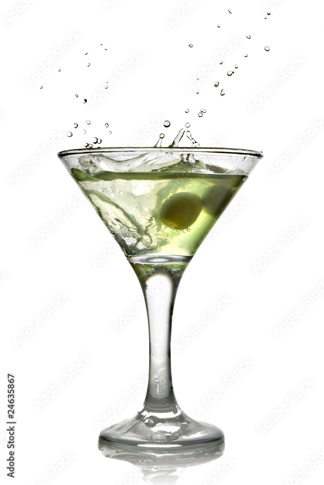 Green alcohol cocktail with splash isolated on white Green alcohol cocktail with splash isolated on white